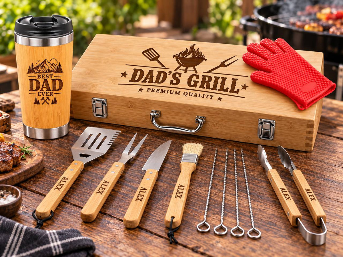 Dad's Grill personalized BBQ tool set and Best Dad Ever bamboo tumbler displayed at a backyard barbecue